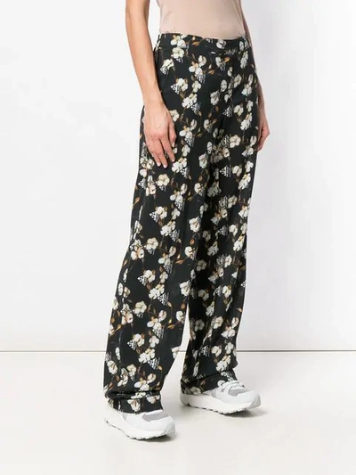 Shop Off-white Cotton Flower Print Trousers In Black