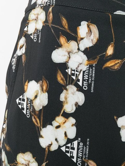 Shop Off-white Cotton Flower Print Trousers In Black