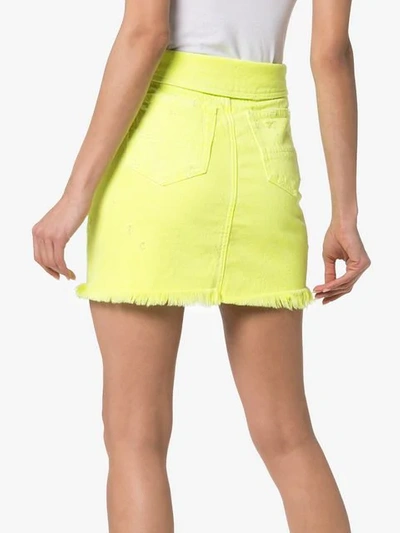 Shop Amiri High-waisted Distressed Denim Mini-skirt In Yellow