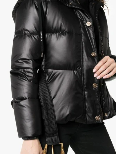 Shop Versace Hooded Belted Feather Down Puffer Jacket In Black