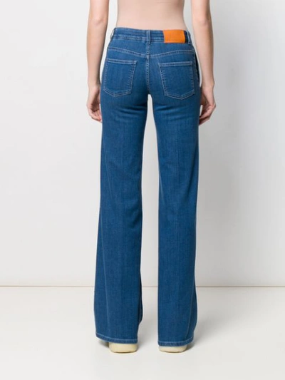 Shop Stella Mccartney Star Detail Flared Jeans In Blue
