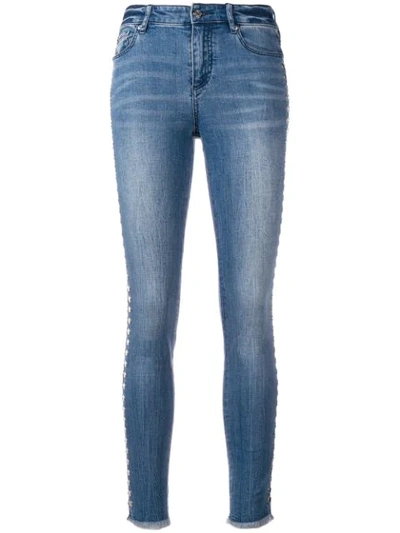 Shop Armani Exchange Studded Jeans - Blue