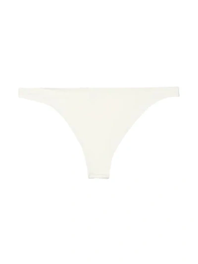 Shop Solid & Striped Plain Bikini Bottom In White