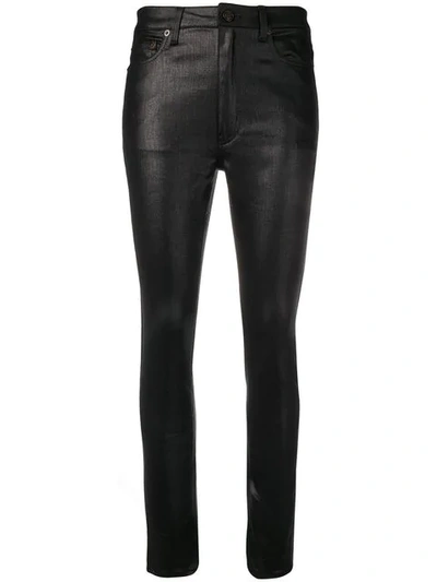 Shop Saint Laurent Coated Skinny Jeans In Black