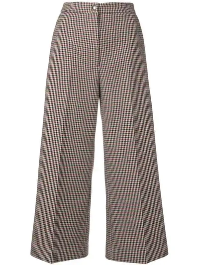 Shop Msgm Dogtooth Cropped Trousers In Red
