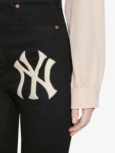 Shop Gucci Denim Skinny Pants With Ny Yankees™ Patch In Black