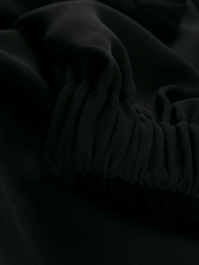 Shop Mm6 Maison Margiela Relaxed Jersey Jumpsuit - Black