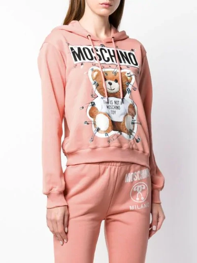Shop Moschino Safety Pin Teddy Bear Hoodie In Pink