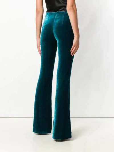Shop Galvan Velvet Flared Trousers - Green