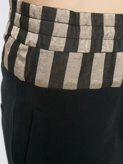 Shop Ann Demeulemeester Striped Hem Track Pants In Black
