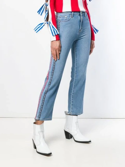 Shop Msgm Logo Band Cropped Jeans In Blue