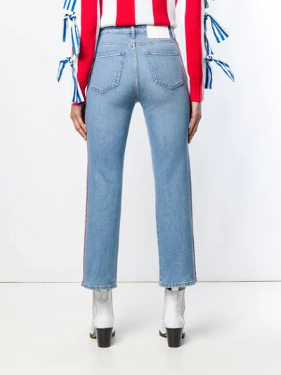 Shop Msgm Logo Band Cropped Jeans In Blue