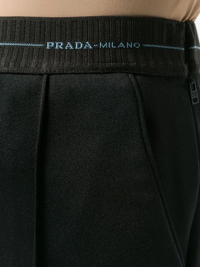 Shop Prada Logo Waistband Track Pants In Black
