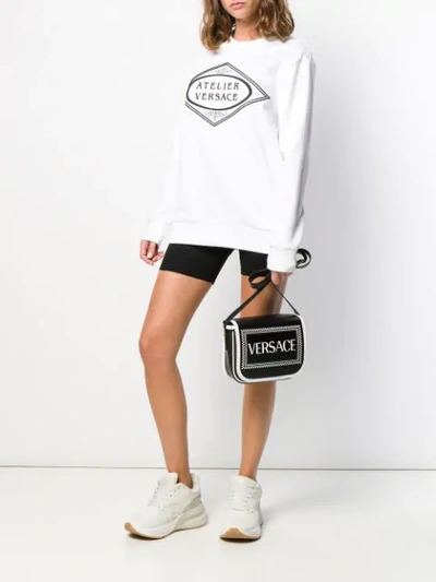 Shop Versace Embroidered Logo Sweatshirt In White