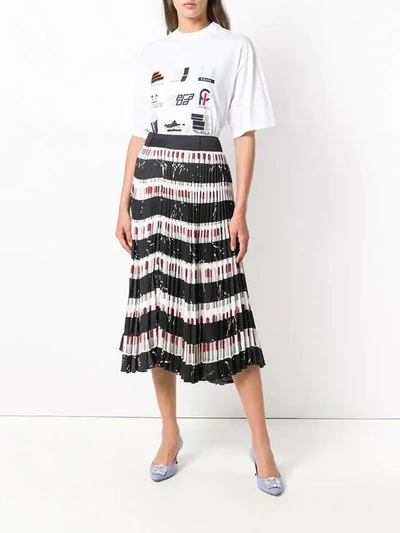 Shop Prada Pleated Printed Skirt In Black