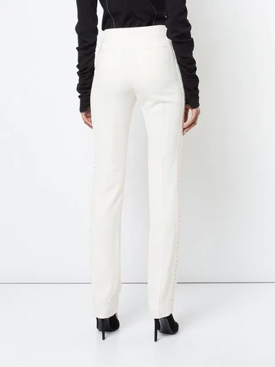 Shop Chloé Slim Fit Embellished Stripe Trousers In White