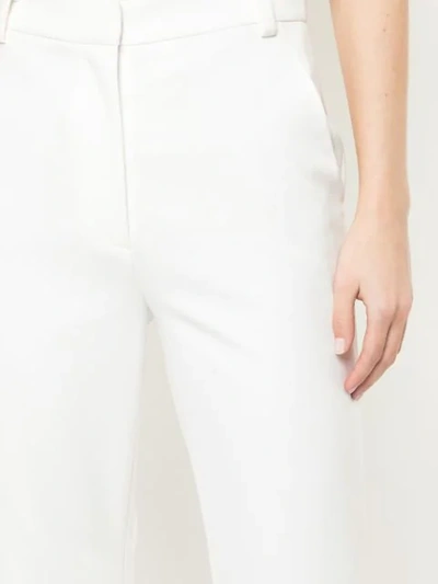 Shop Tibi Anson Bootcut Trousers - White