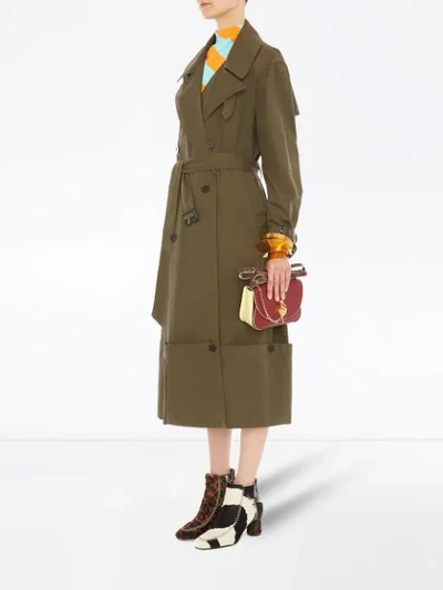 Shop Jw Anderson Fold-up Hem Trench Coat In Green