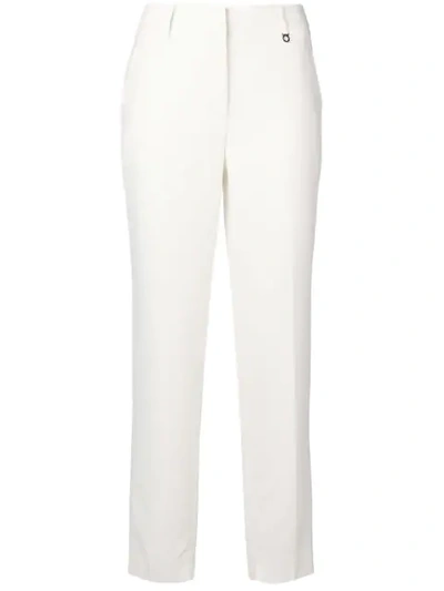 Shop Ferragamo Skinny Trousers In White