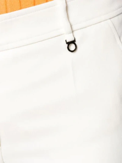 Shop Ferragamo Skinny Trousers In White
