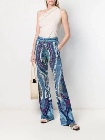 Shop Etro Paisley Print Flared Trousers In Blue