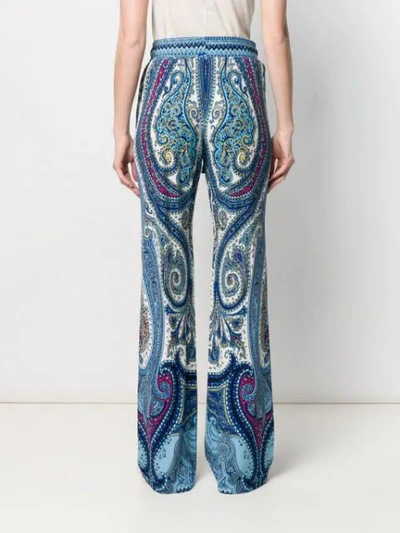 Shop Etro Paisley Print Flared Trousers In Blue