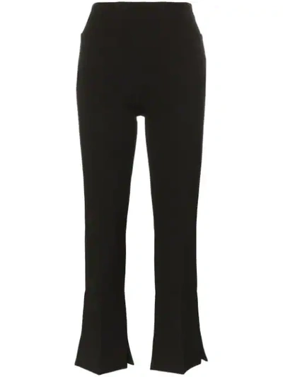 Shop Roland Mouret Goswell Flared Split-hem Trousers In Black