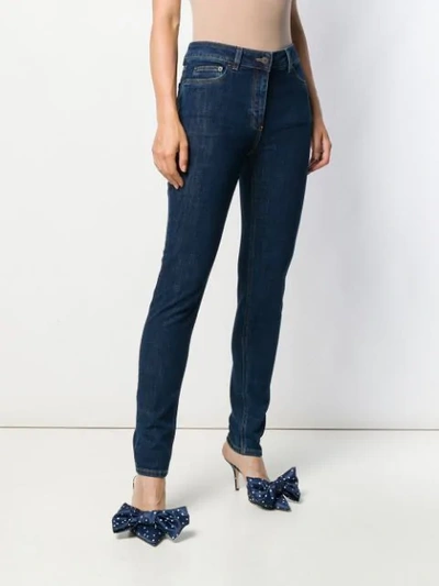 Shop Moschino Teddy Embroidered Skinny Jeans In Blue