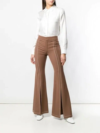 Shop Chloé Front Slit Trousers In Brown