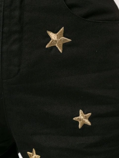 Shop Saint Laurent Star Embroidered Denim Shorts In Black