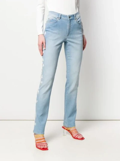 Shop Escada Embroidered Trim Straight Jeans In Blue