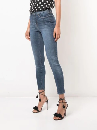 Shop L Agence Skinny Cropped Stonewashed Jeans In Blue