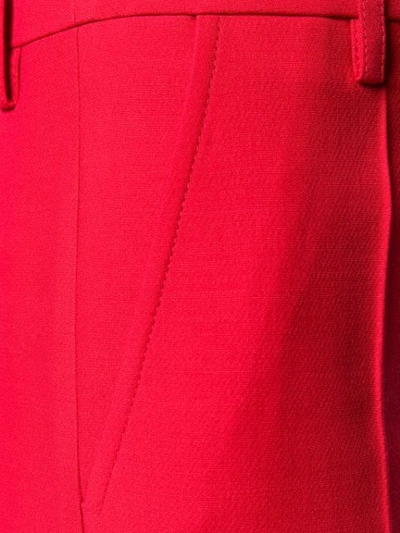 Shop Valentino High Waisted Flared Trousers In Red