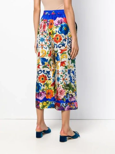 Shop Dolce & Gabbana Floral Pattern Trousers In Blue