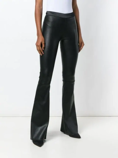 Shop Drome Leather Flared Trousers In Black