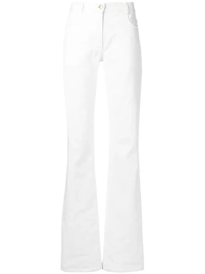 Shop Nina Ricci Bootcut Jeans In White