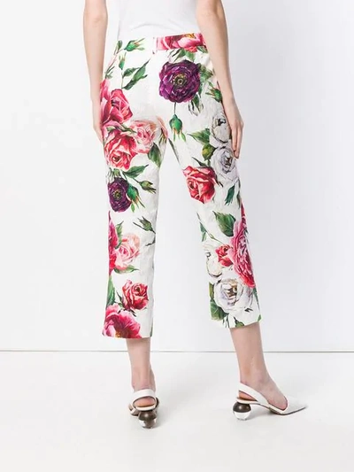 Shop Dolce & Gabbana Rose Printed Cropped Trousers In White