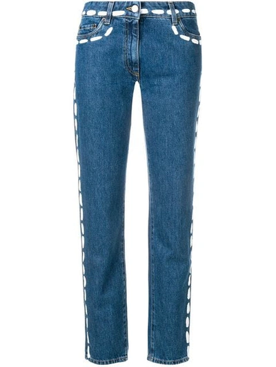 Shop Moschino Painted Stitch Jeans In 3288