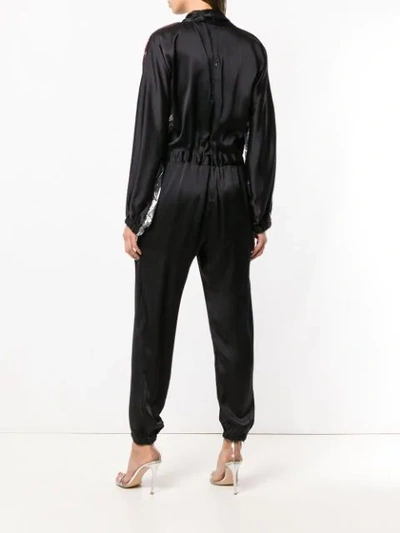 Shop Coup De Coeur Jumpsuit With Metallic Inserts In Black