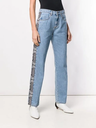 Shop Msgm Snakeskin Effect Stripe Jeans In Blue