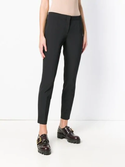Shop Prada Skinny Trousers In Black