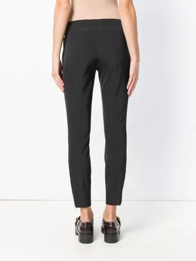 Shop Prada Skinny Trousers In Black