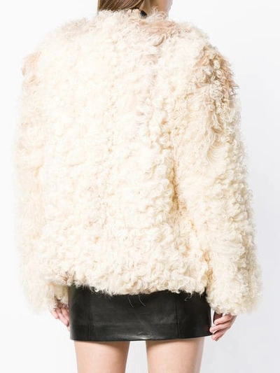 Shop Saint Laurent Short Shearling Jacket - Neutrals