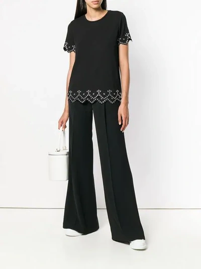 Shop Michael Michael Kors Flared Leg Trousers In Black