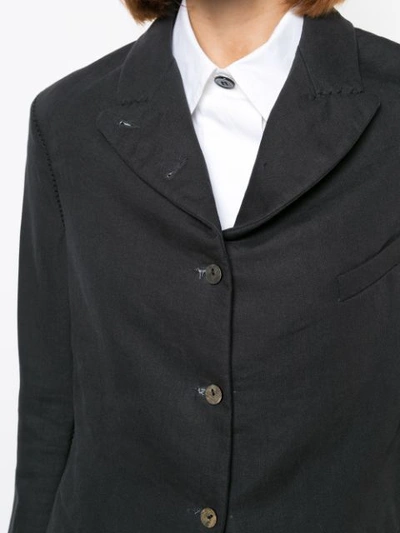 curved hem buttoned blazer