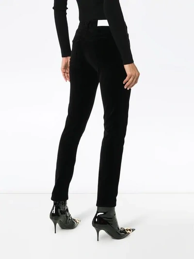Shop Re/done Velvet High-waisted Skinny Trousers In Black