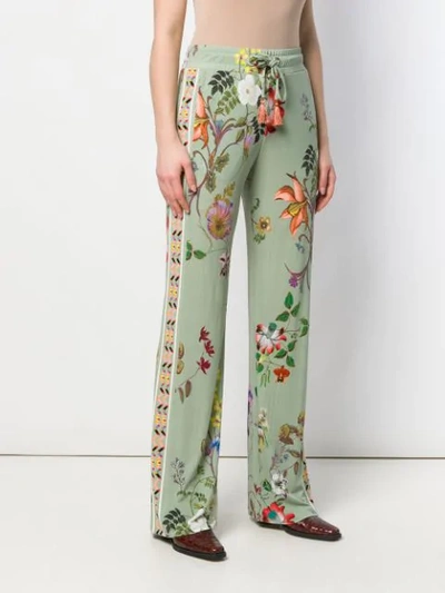 Shop Etro Floral Print Trousers In Green