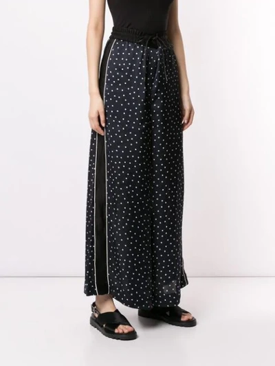 Shop Sacai Polka Dot Palazzo Trousers In Black