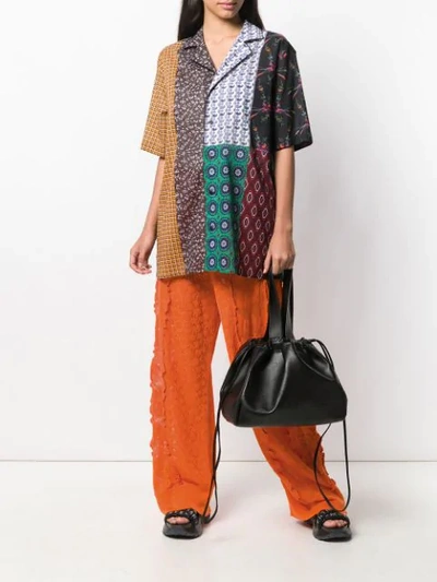 Shop Stella Mccartney Wide-leg Lace Trousers - Orange
