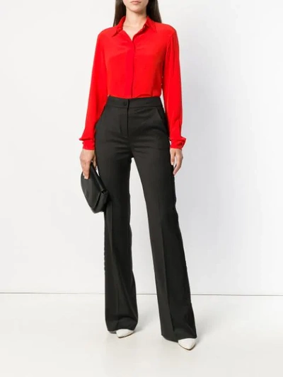 Shop Blumarine Ruffle-trimmed Trousers In Black